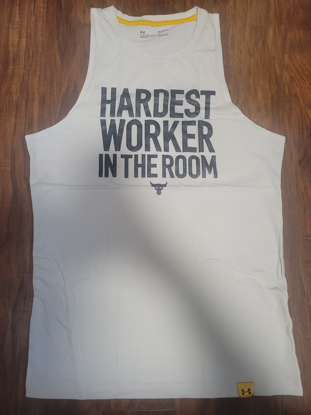 Under Armour White Tank Top with Bold Black 'Hardest Worker in the Room' Graphic